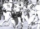 Junior linebacker Parker Bradley (51) of Minneota closes in on a Lakeview ball carrier Friday night in the Vikings’ 63-8 Homecoming win. 