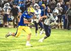 Gage Johnston breaks loose on his way to a 54-yard touchdown run last Thursday against Minnesota Valley Lutheran.