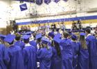 Minneota seniors set off confetti and began tossing their mortarboard hats in the air in celebratory fashion after officially graduating on Saturday.