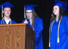 Left to right: Reagan Bierschenk, Autumn Dovre, Michael Pitzl speak at the graduation ceremony on Saturday, May 13. 