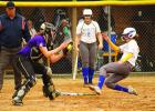 Kaylee Johnson (right) of Minneota went into her slide and despite the ball getting to Montevideo catcher Sydney Zinnel, Johnson was safe.