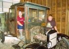 Carter Anderson, left, and twin brother, Logan, pose next to the 1925 Model T truck they recently took out of storage from their grandfather’s farm. 