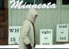 Waling past the Minneota Public Library,