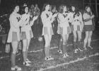 Although there wasn't much to cheer about as Minneota lost its Homecoming football game to Jasper, 50-6, on Sept. 20, 1974, these cheerleaders still tried their best to keep the crowd into the game. Left to right: Gloria Fredricks, Annette Buysse, Deborah Bradley, Mary Swedzinski, and Cathy Claeys.