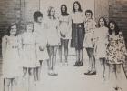 These nine girls were queen candidates and reigning royalty for Belgian-American Days in Ghent in 1975.  Left to right: Donna Thooft, reigning princess; Jean Derynck, reigning queen; and candidates Kris Gladis, Patty Verstraete, Rhonda Wenker, Diane Duthoy, Suzy Boerboom, Carol Derynck, and Cathy Claeys.