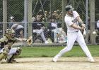 Tyson Sonnenburg of the Mudhens lines a single against Benson in an amateur game on Monday at K.P. Kompelien Field in Minneota. 