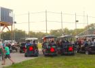 Many fans of the Minneota Mudhens take a seat behind home plate in their golf carts. There were 17 golf carts at the Mudhens’ last home game on July 19. 