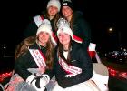The 2025-26 Boxelder Bug Days royalty recently rode in the Hometown Holidays Parade in Canby. Front, left to right:  Princess Addison Buysse and Queen Brynn Kern. Back row, left to right: Princesses Natalie Ratajczak and Clare Swedzinski. 