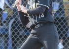 Minneota/Canby senior catcher Kiersyn Hulzebos avoids getting hit with a high and tight fastball against Renville County West last Tuesday in Minneota.