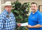 The State Bank of Taunton recently donated $1,000 to the Porter Trail Dusters Horse Club for a new sound system at their arena. Club member Dennis Gawarecki, left, accepts a check from State Bank of Taunton Vice President Doug DeSmet. The next horse show will be held at noon on Sunday, Aug. 22 in Porter.
