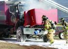 Minneota firemen hurried to douse the fire in VanHecke's truck.