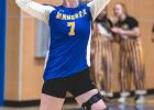 Madison senior Madison Minnehan serves to start the match against Canby last Tuesday. 