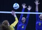 Morgan Kockelman and Lydia Sussner went up to block a shot by New Life Academy's Kate Rogers.